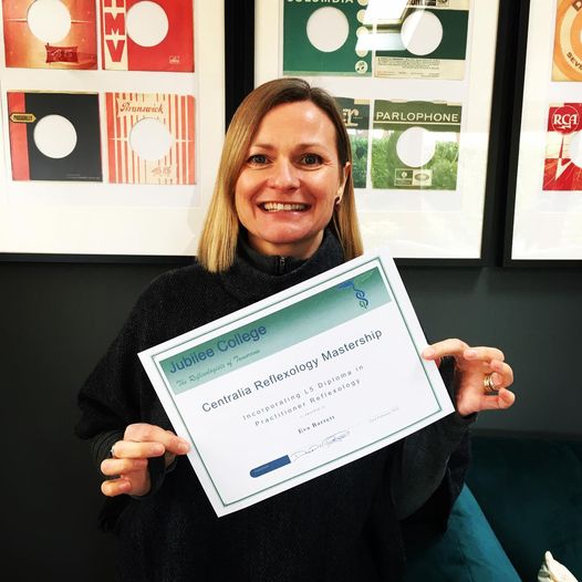 Eva Barrett with the Level 5 Reflexology Mastership Certificate